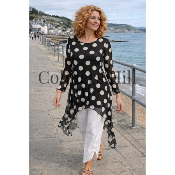 Kozan Mandy Tunic in the spotty black and white Dalmation print. Made of a fine mesh fabric, it is semi-sheer