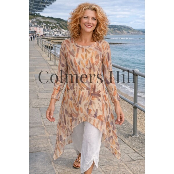 Kozan Mandy Tunic in the abstract and painterly Trio print. Made of a fine mesh fabric, it is semi-sheer