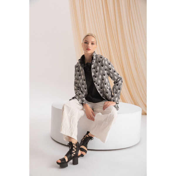 Kozan Jane Jacket with a zip front in a black and white Geisha print is a striking jacket, great for work, dinners or smarter occasion