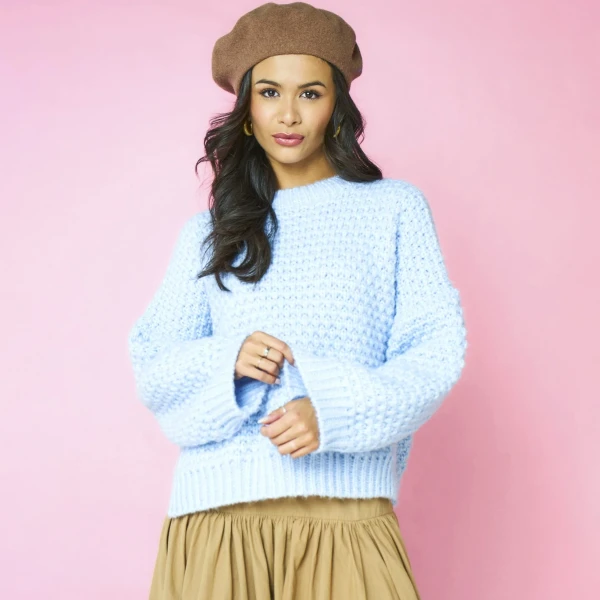 Model wearing Darwin oversized pastel blue textured jumper